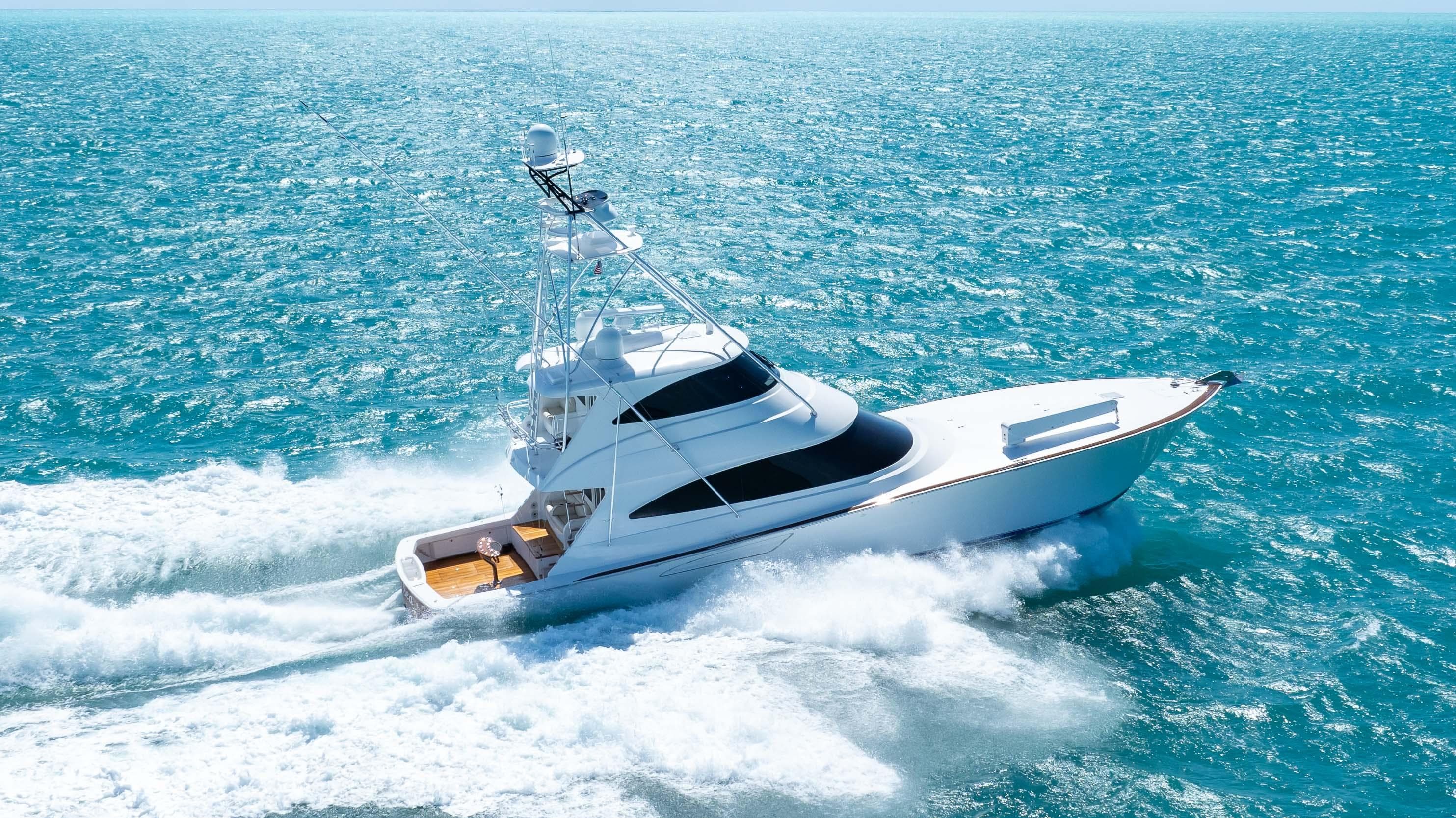 2019 Viking 72 Enclosed Bridge yacht cruising on open sea.