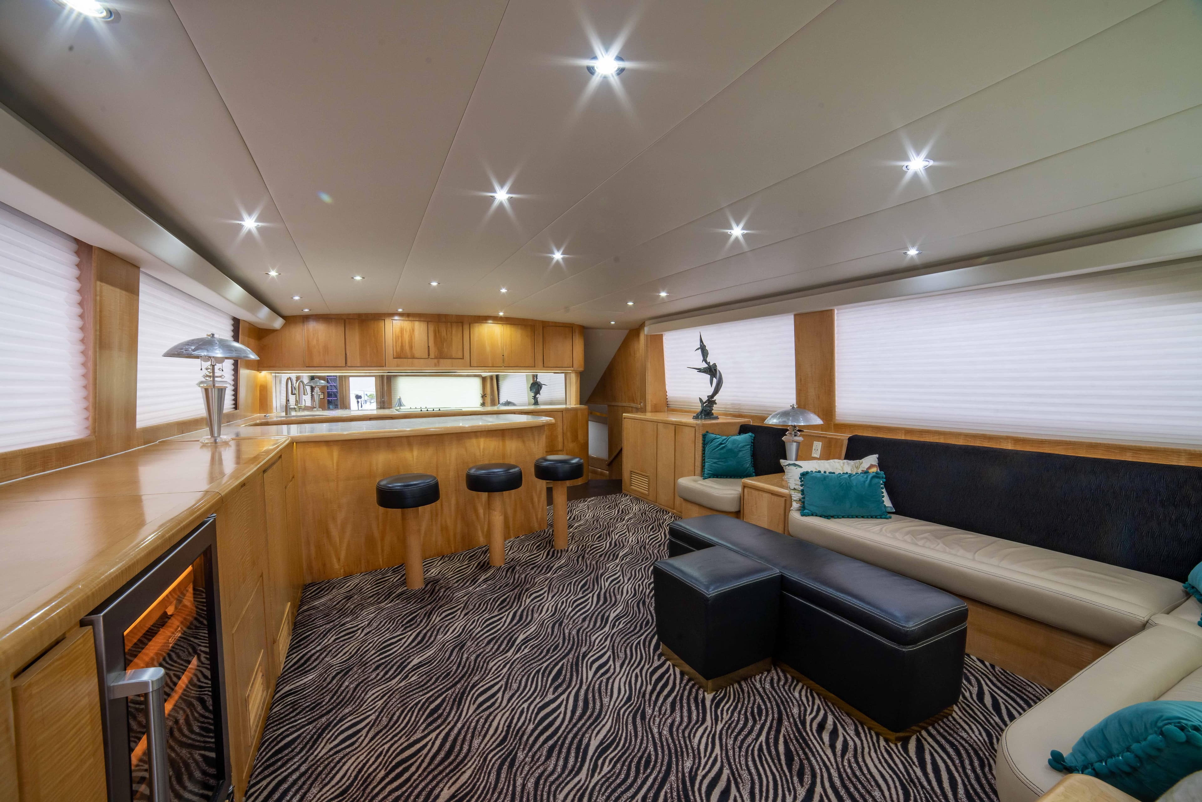 Luxurious interior of 1996 Donzi 72 Custom Convertible yacht with modern decor.