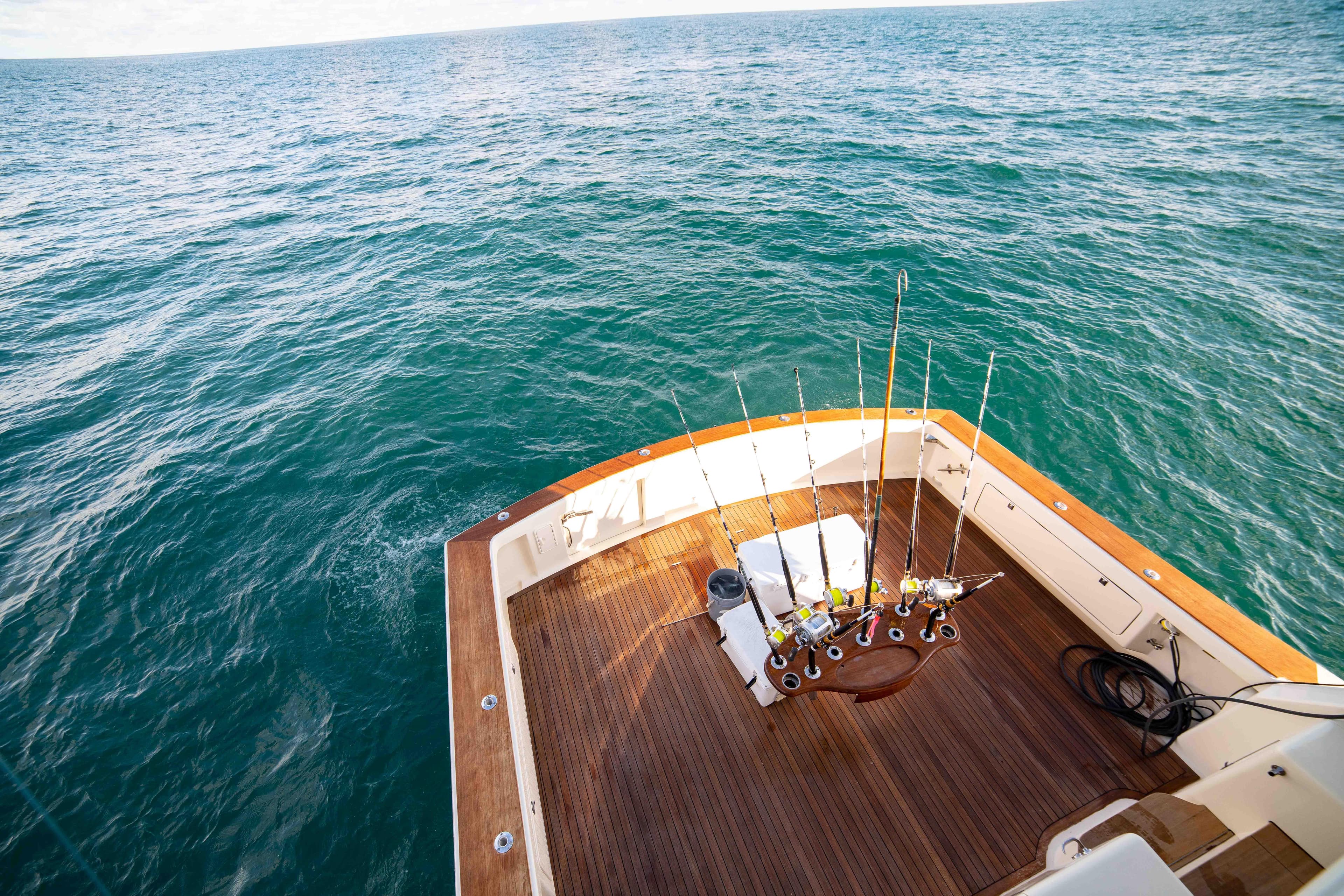 Fishing deck of 1996 Donzi 72 Custom Convertible yacht on open water.