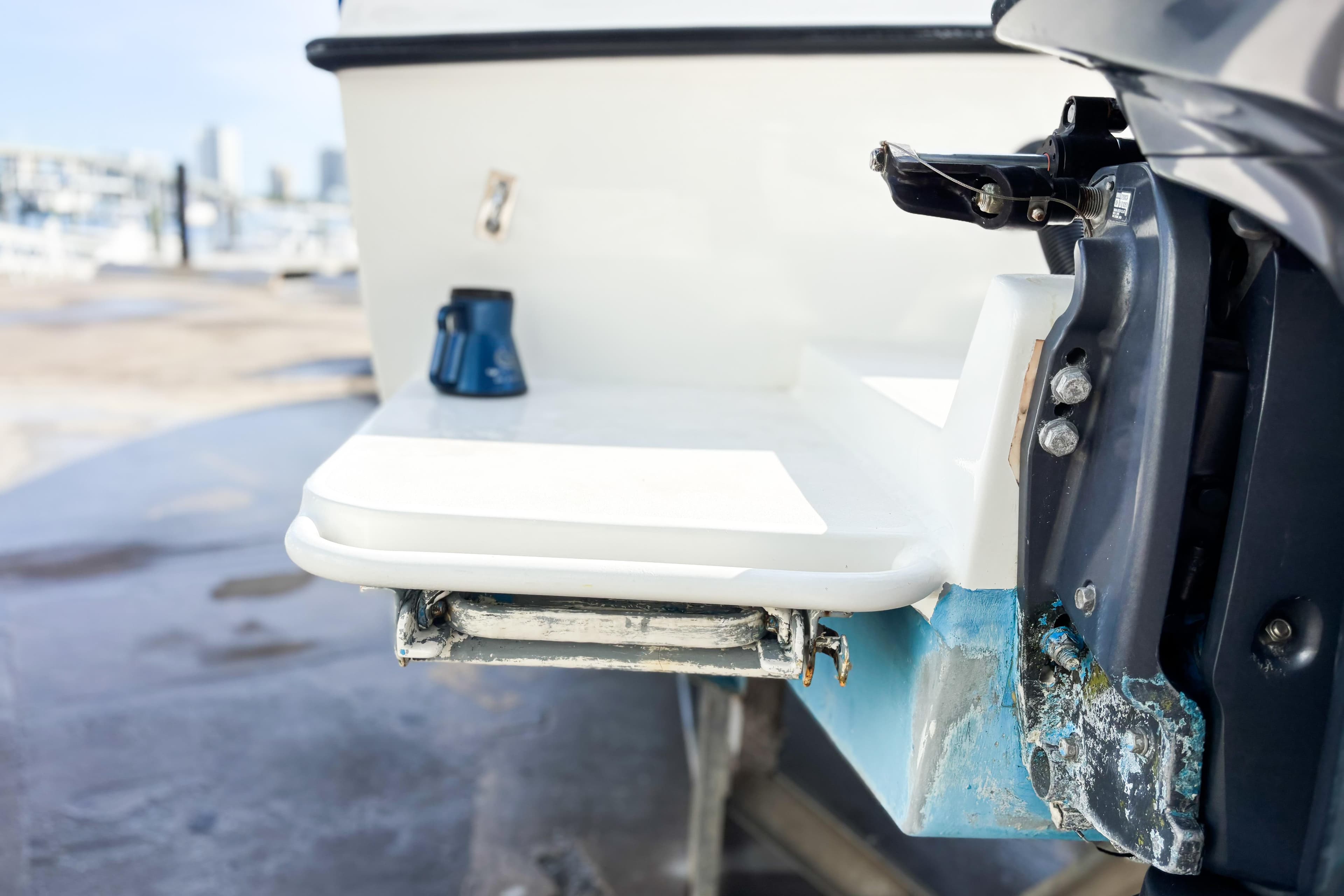 2016 Whitewater boat stern with motor mount and small platform.