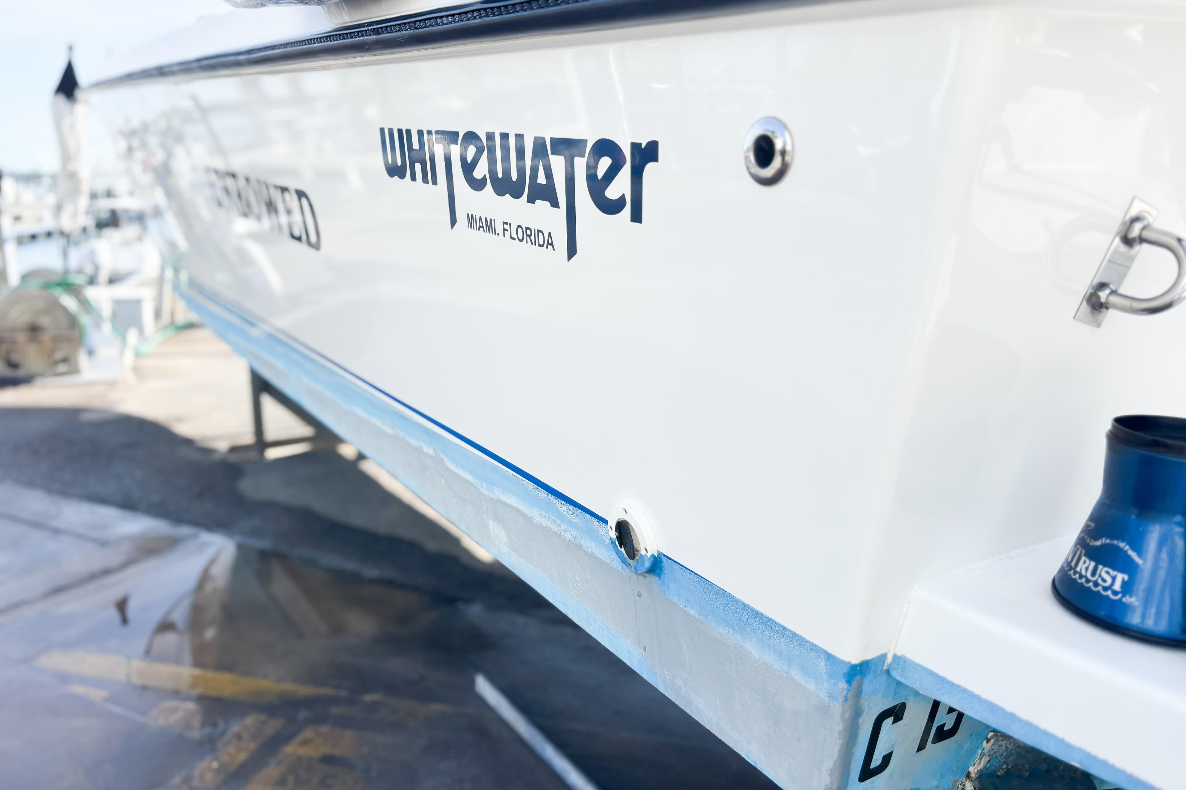 Whitewater boat from 2016, docked in Miami, Florida, with visible branding.