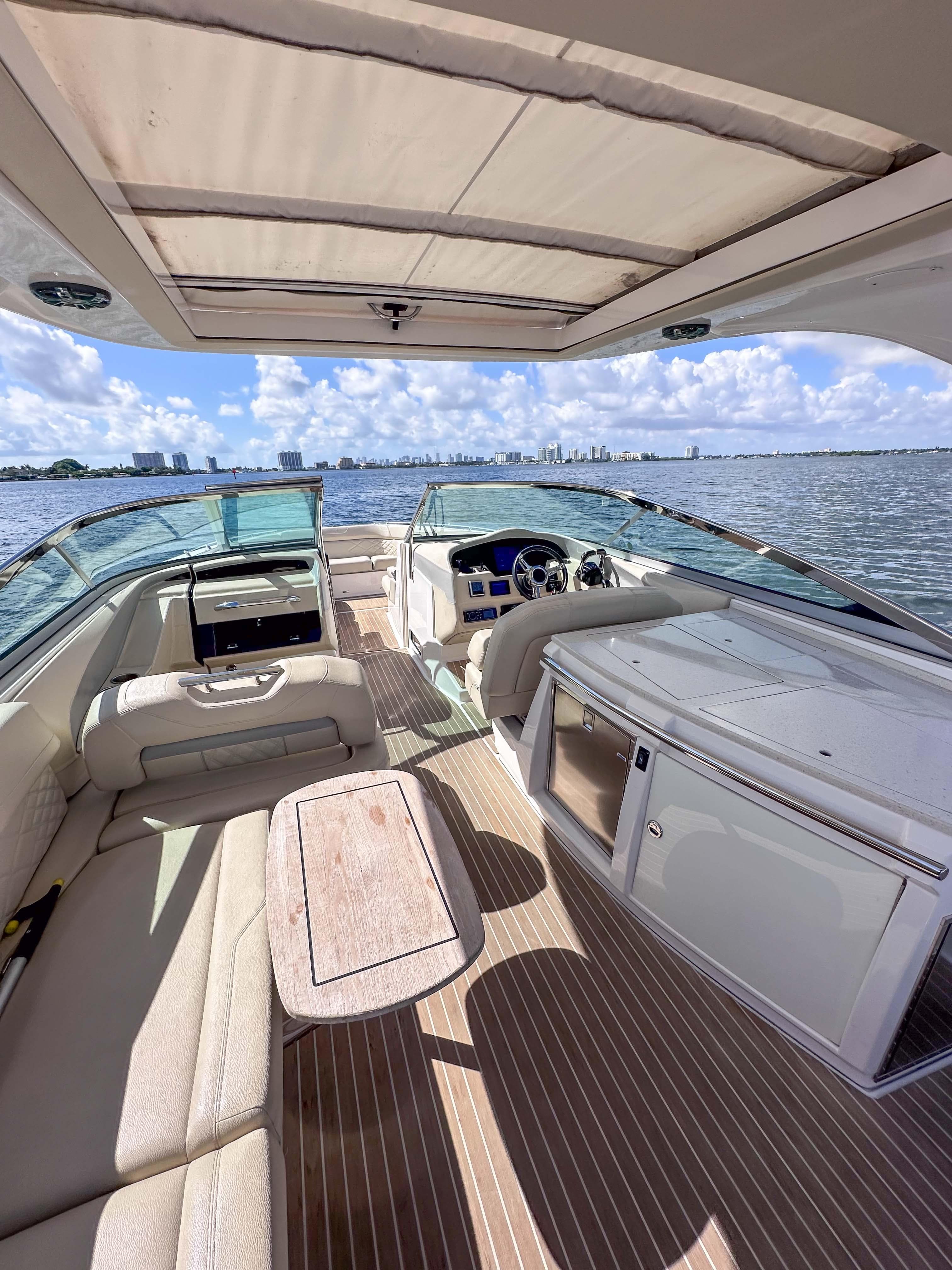 2019 Regal 33 OBX boat interior with spacious seating and modern amenities on open water.