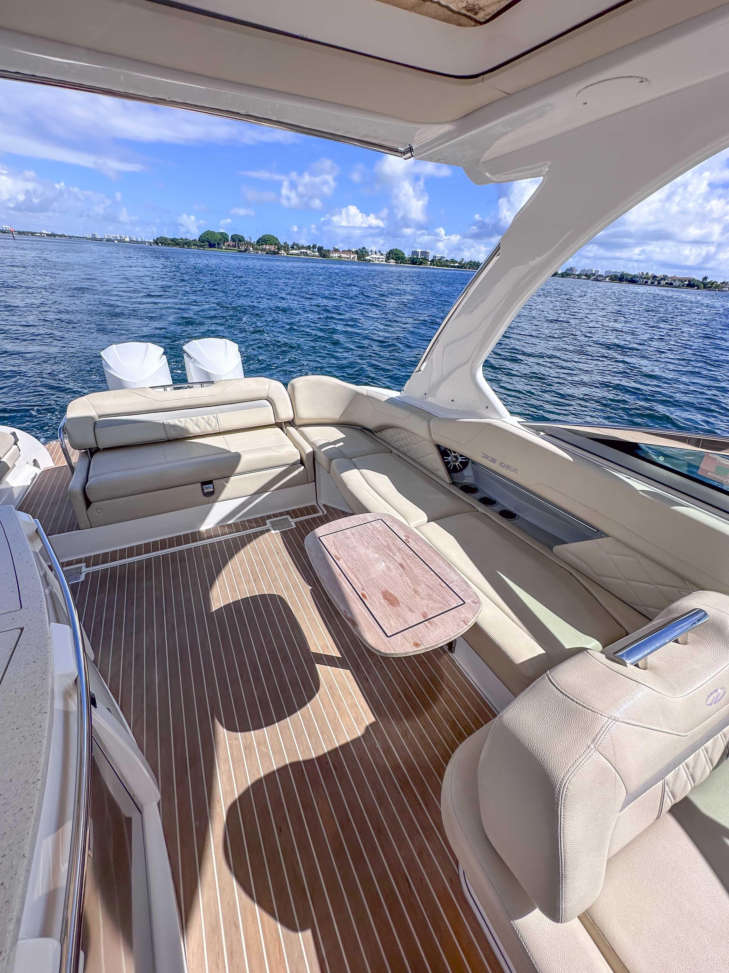 2019 Regal 33 OBX yacht interior with luxurious seating and ocean view.