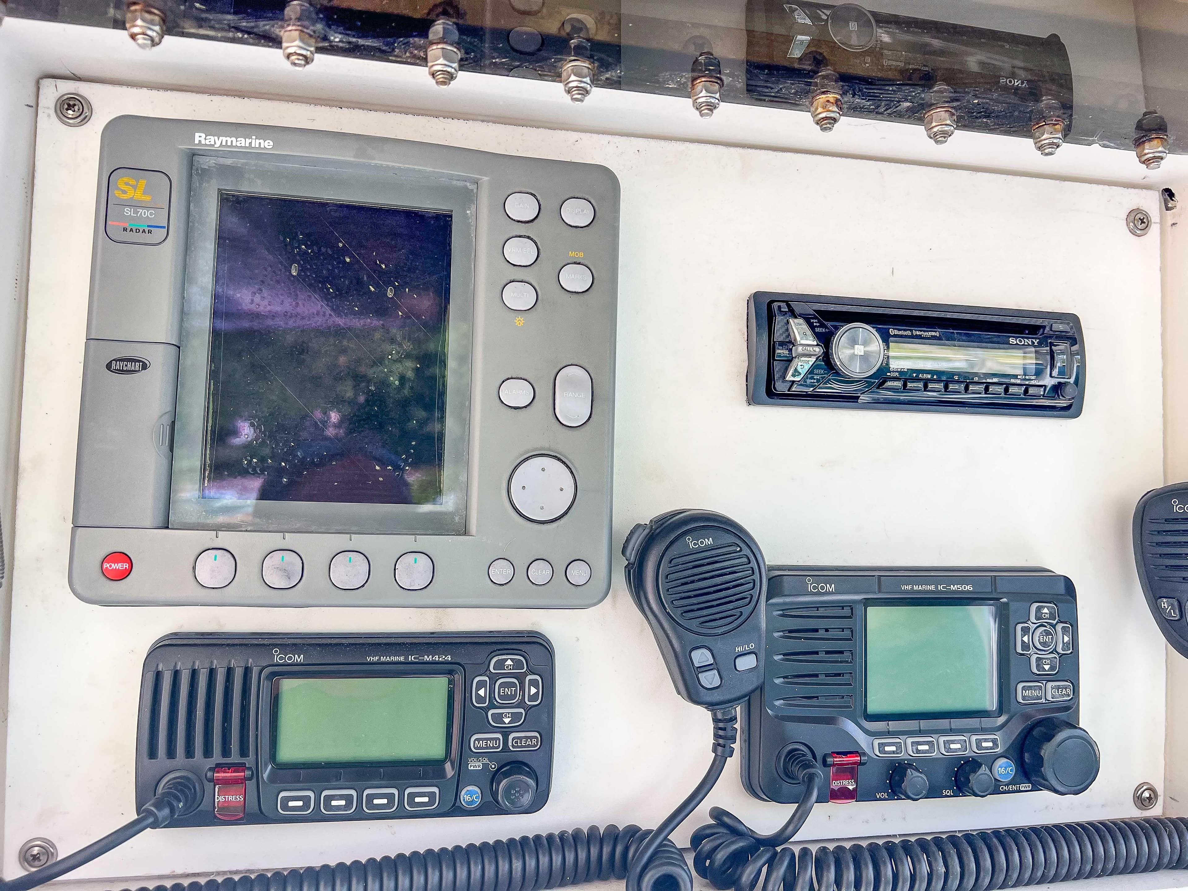 2000 Luhrs 400 Convertible boat dashboard with navigation and communication equipment.