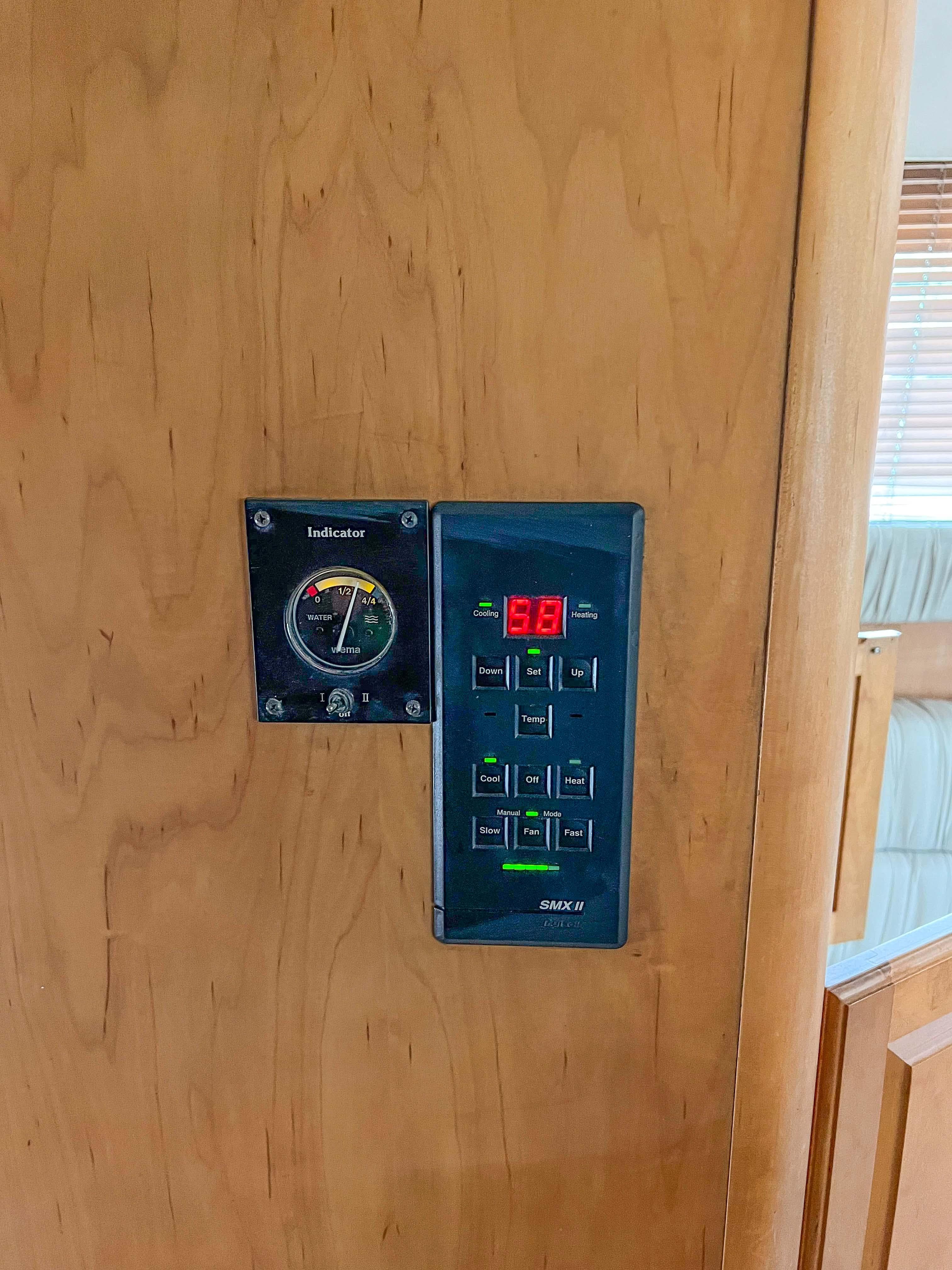 Control panel on a 2000 Luhrs 400 Convertible boat.